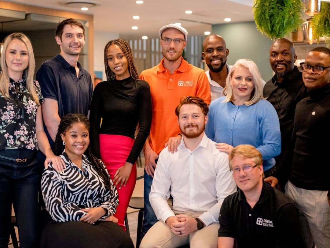 Prebo Digital team standing in a group
